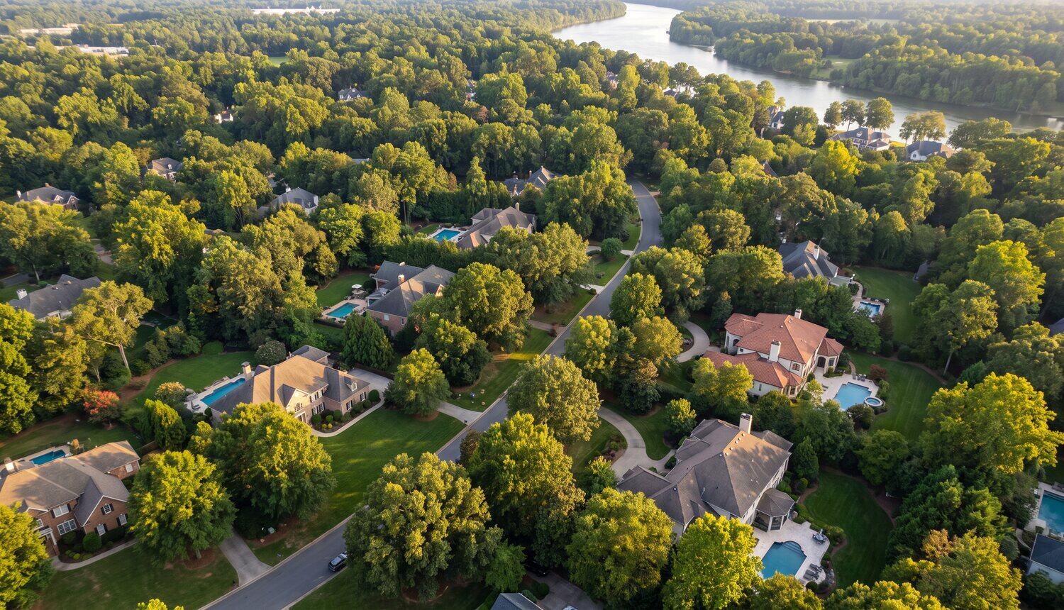 Aerial view of a Carolina neighborhood under tree canopy